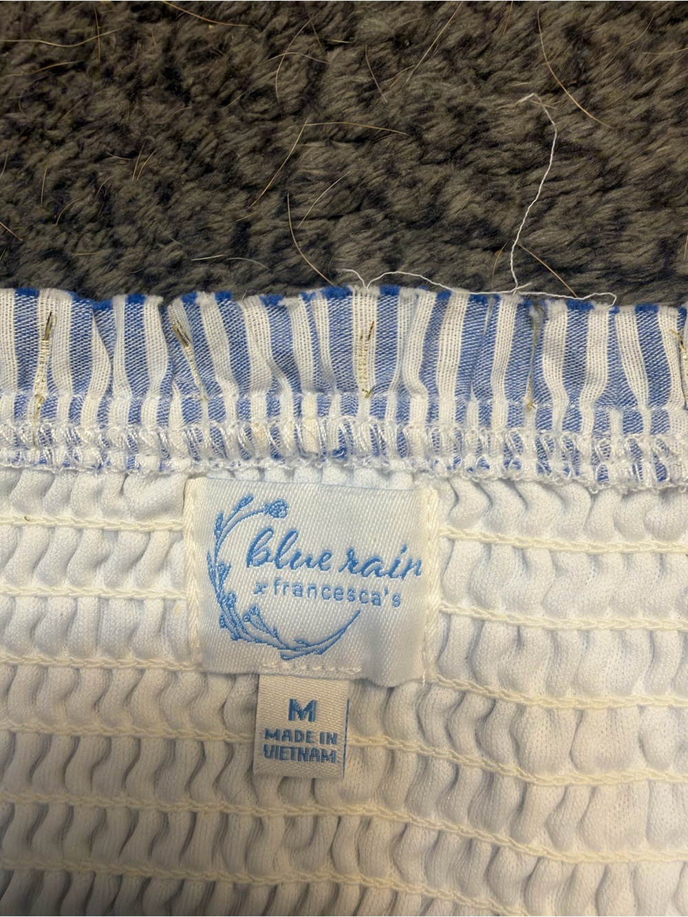 Francesca’s Women’s Blue and White pinstripe skirt with subtle gold stitching.